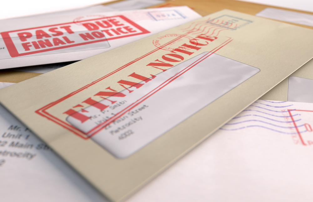 A stack of past due bills